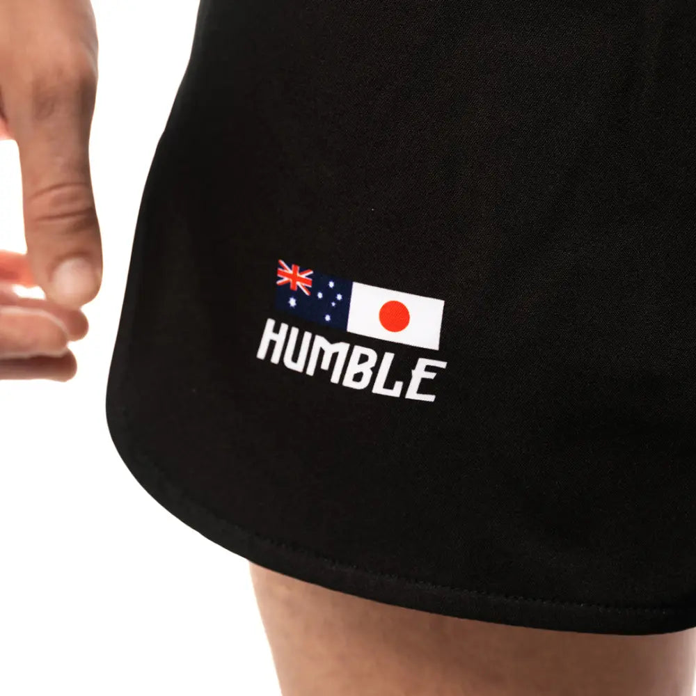 Humble logos on the front of the shorts.