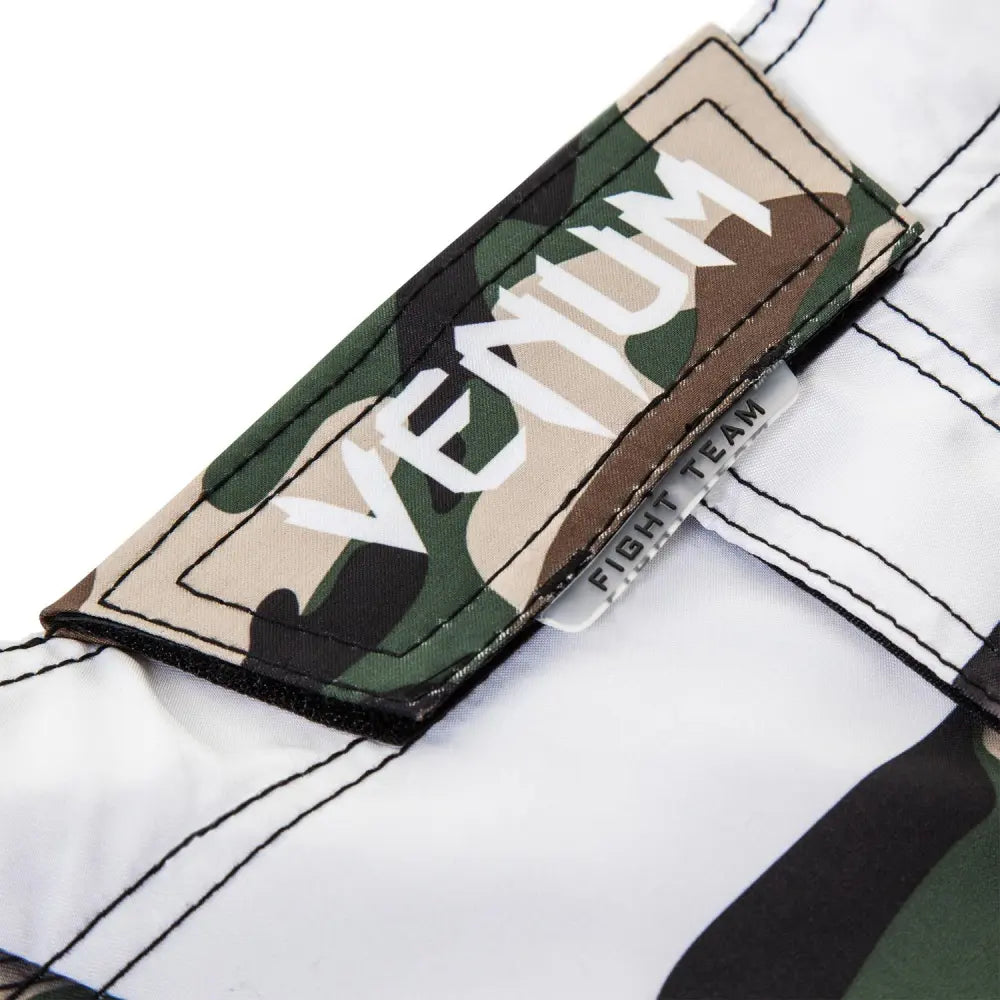 Venum logo on the waistband of Venum Camo Hero Fightshorts