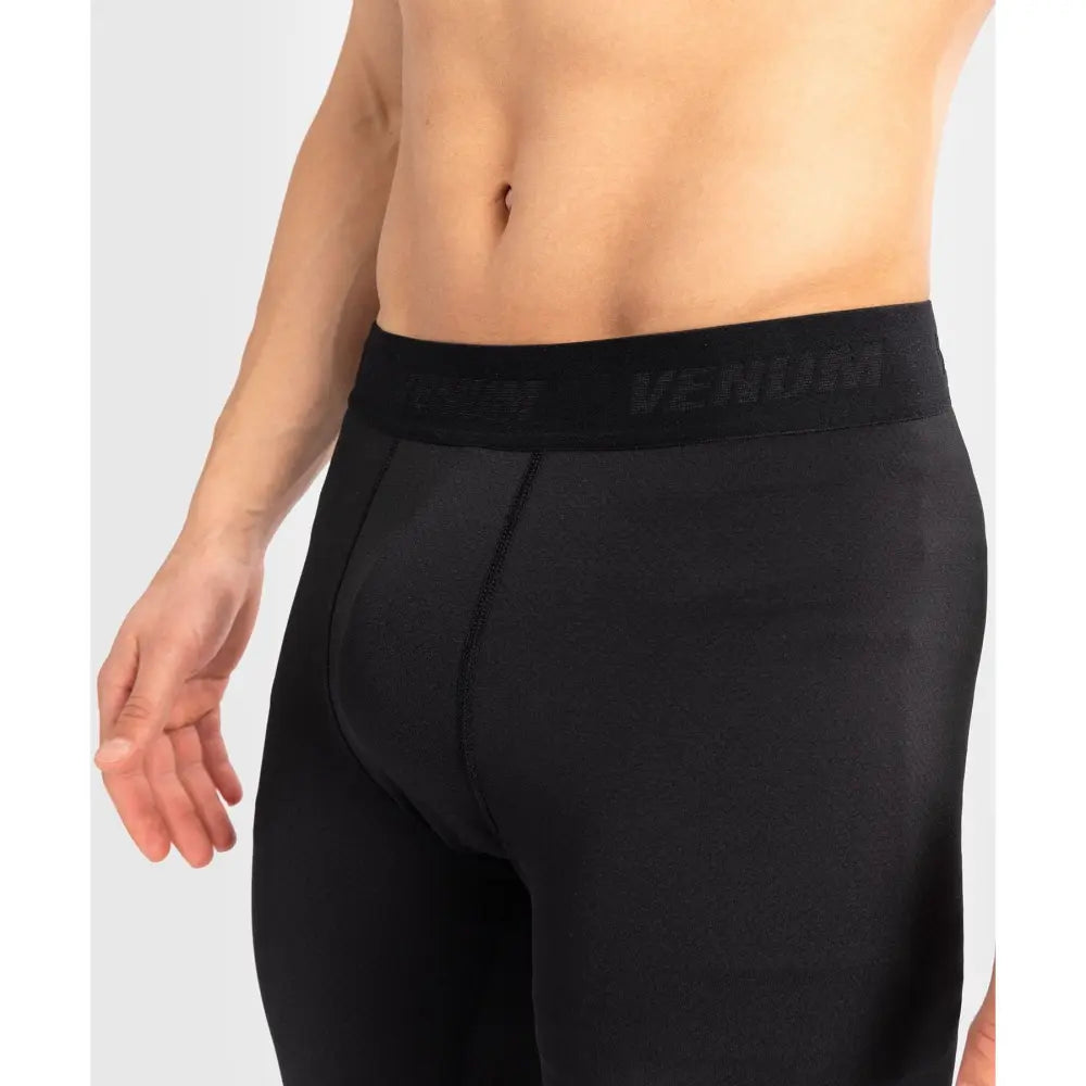 Subtle Venum logos around the waistband