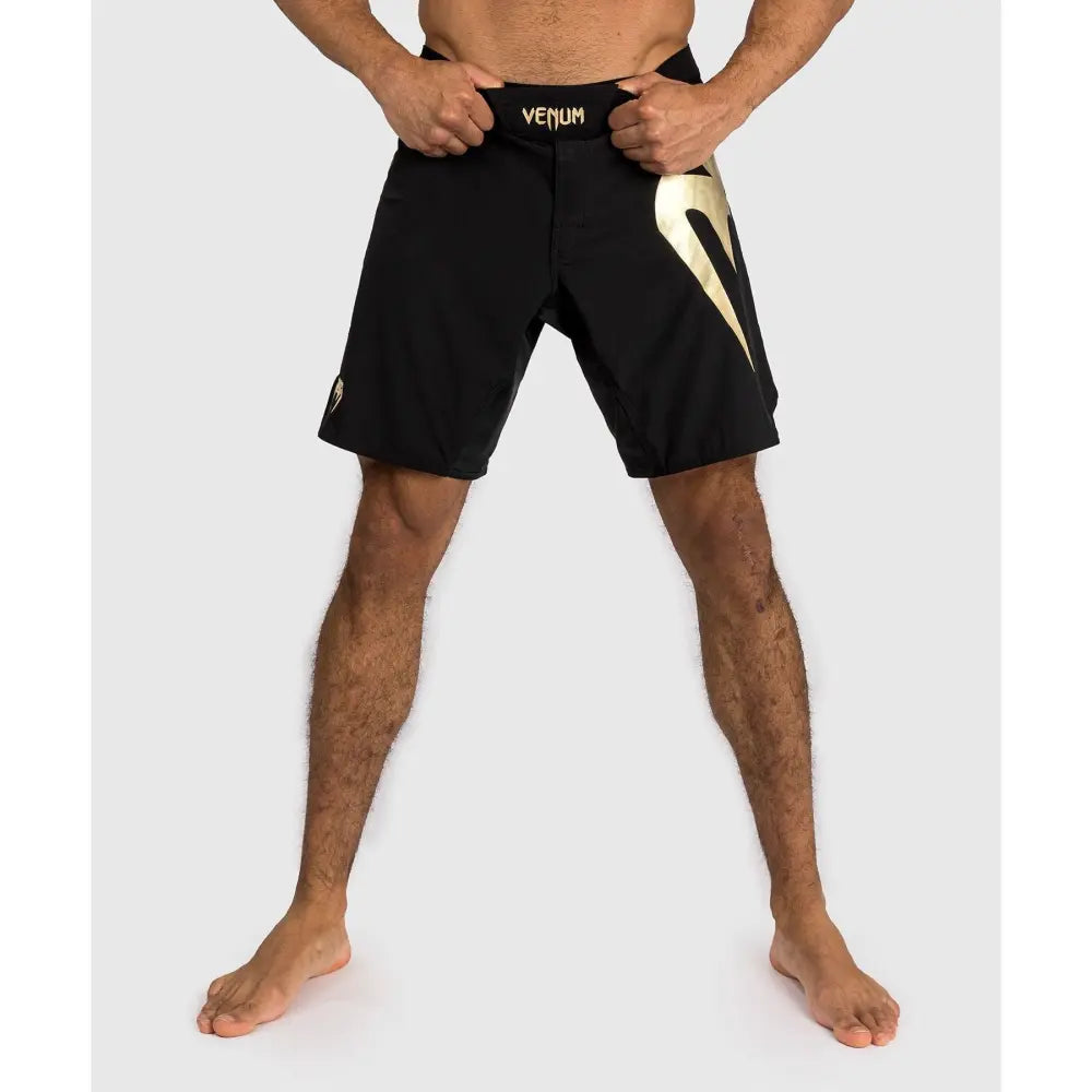 Venum Fight shorts - Black with Gold logos