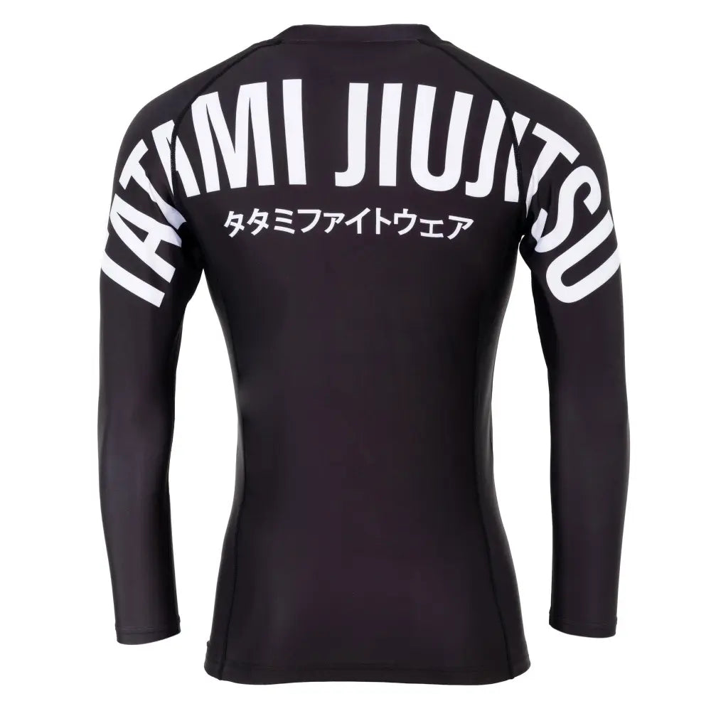 bold Tatmi logo text across the back of this BJJ Rashguard