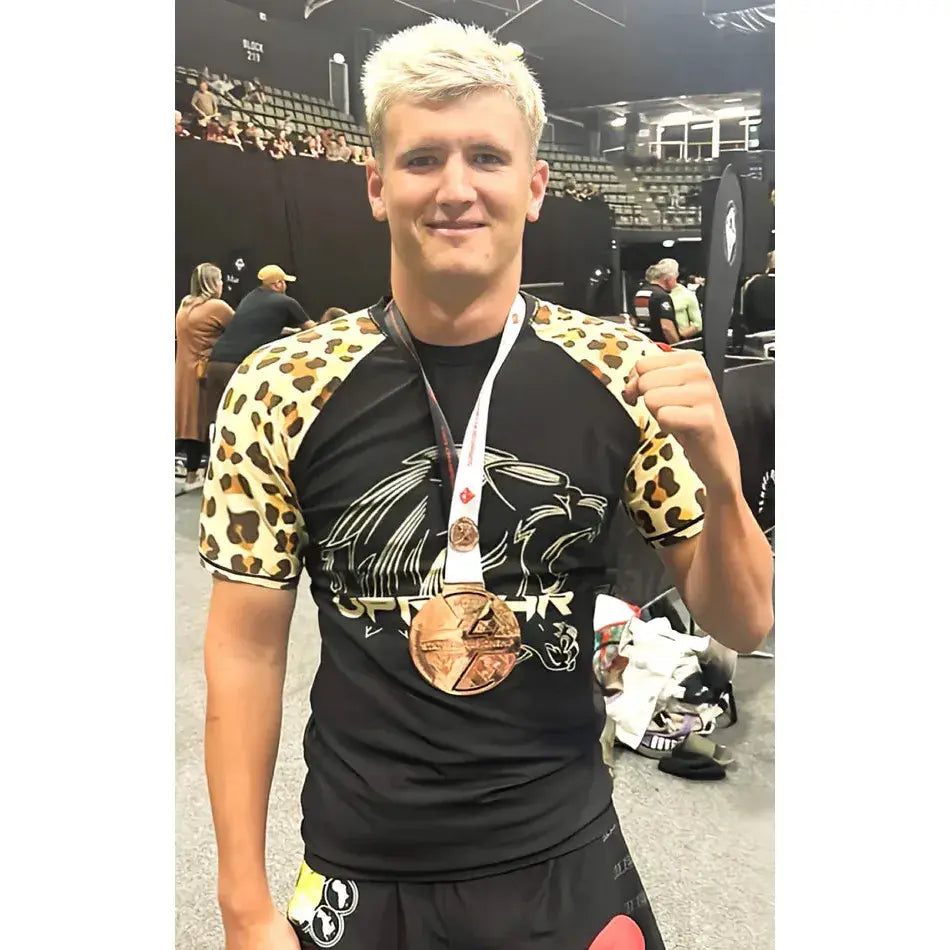 One of our local WA BJJ competitors wearing the rashguard at a local comp