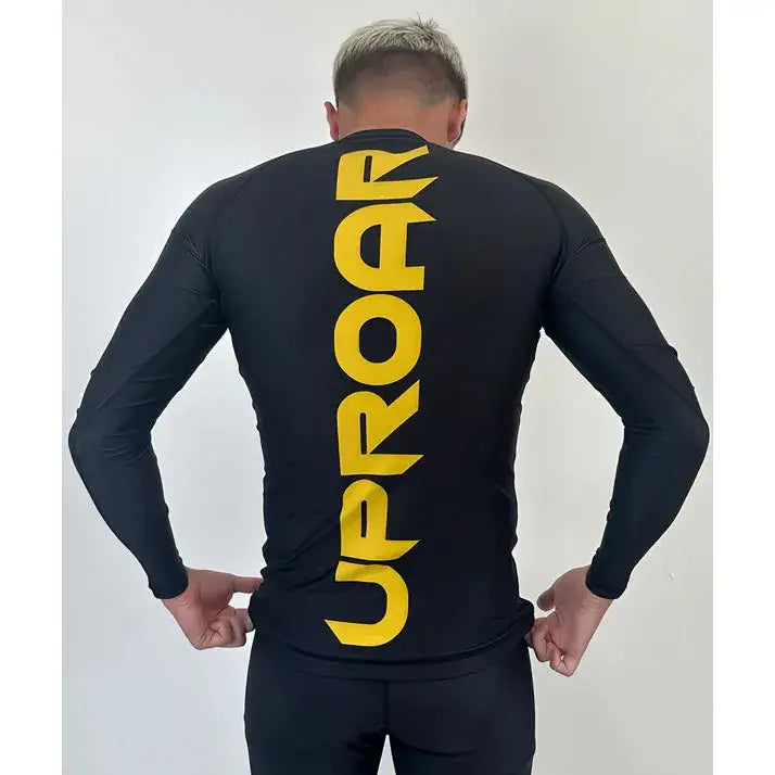 Yellow Uproar logo on the back